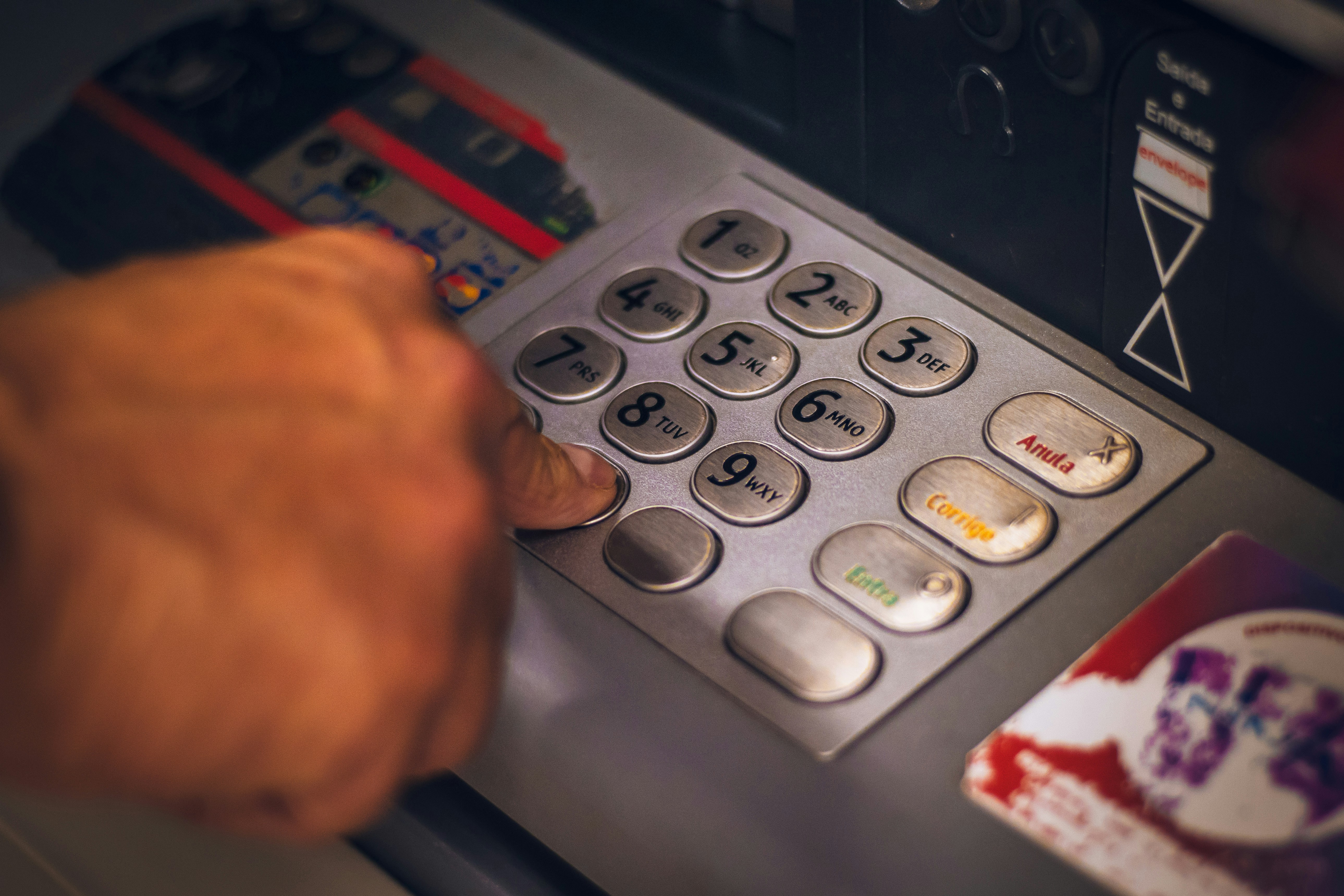 ATM keypad representing the everyday banking infrastructure the company’s customers rely on